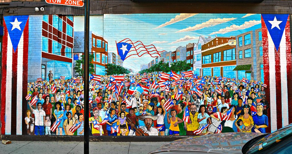 Art Photography: GAMALIEL RAMIREZ (1949-2018, Puerto Rico), Sea of Flags (2004). Street mural in Chicago’s Humboldt Park neighborhood.